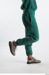 Nathaniel  1 dressed flexing green jogging pants grey sneakers…